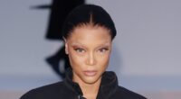 Tyra Banks, 51, shows off her taut complexion with dramatic bleached eyebrows as she attends Balenciaga show at Paris Fashion Week