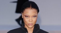 Tyra Banks, 51, shows off her taut complexion with dramatic bleached eyebrows as she attends Balenciaga show at Paris Fashion Week