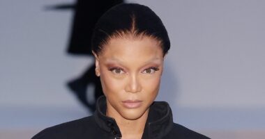 Tyra Banks, 51, shows off her taut complexion with dramatic bleached eyebrows as she attends Balenciaga show at Paris Fashion Week