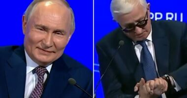 Watch as smug-looking Putin keeps Trump waiting for crunch call – by staying at event ONE HOUR after it was set to begin