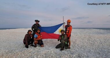 Brazen China plants flag on seized TINY 2,000sq ft sandbank in WW3 flashpoint sea…before Philippines’ tit-for-tat reply