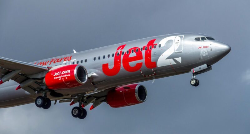 Jet2 flight heading to holiday hotspot diverts mid-air to KICK OFF rowdy passengers sparking three hour delay