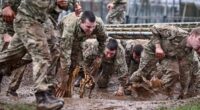 Royal Marine says he was arrested and treated like a terrorist after complaining that women on the front line will make unit 'unrecognisable, weak and compromised'