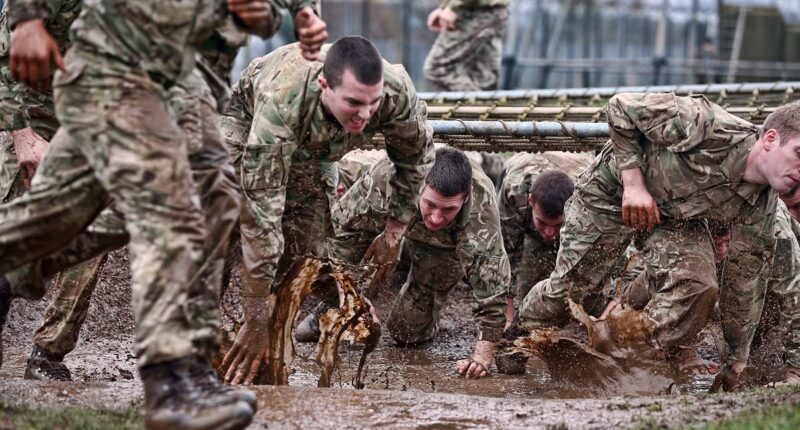 Royal Marine says he was arrested and treated like a terrorist after complaining that women on the front line will make unit 'unrecognisable, weak and compromised'