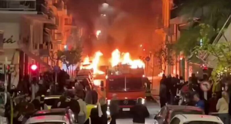 Shock vids shows Athens turned into WARZONE as petrol-bomb armed mob attack police with 21 cars torched & 72 arrested
