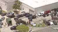 Three shot at car dealership in Miami-Dade after masked man with rifle storms business and starts shooting