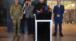 A Russian drone strike in northeastern Ukraine kills 9 people, officials say