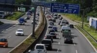 Airport bus full of tourists ploughs into stationary traffic injuring 21 in Germany as traveller fights for their life