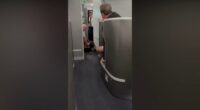 American Airlines passenger restrained, knocked to floor while barging into cockpit: video
