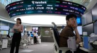 Asian shares mostly gain amid cautious relief over U.S.-China agreement