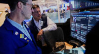 Asian shares slide and US futures and dollar drop after Wall Street's winning week