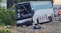 At least one dead and 32 injured after tour bus collides with car that burst into flames in horror Mother’s Day crash