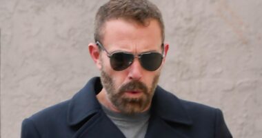 Ben Affleck is glued to his phone as he treats kids Fin and Samuel to lunch after visiting ex Jennifer Garner