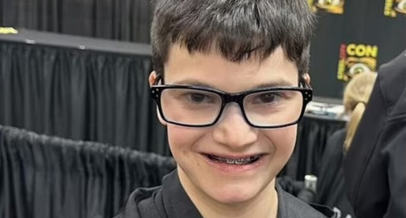 Boy, 13, dies after being run over by Memorial Day parade float he had fallen from in heartbreaking freak accident