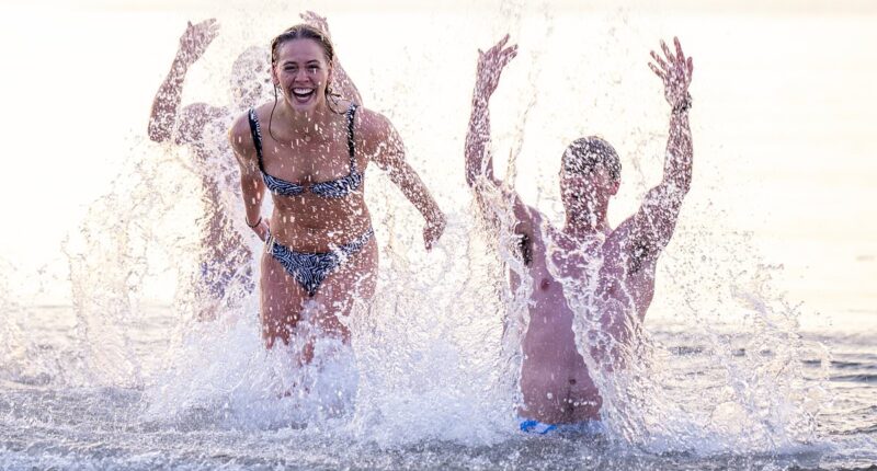 Britain will bask in hottest day of the year today and warmest May Day EVER as temperatures soar towards 30C - but enjoy it while you can