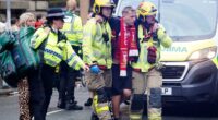 Driver arrested after vehicle plows into crowd of Liverpool soccer fans during celebration