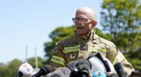 Fire chief chokes with emotion as he tells of 'heavy heart' after death of two brave colleagues in Bicester heritage car centre blaze as two more are treated in hospital following inferno