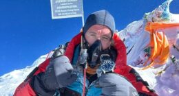 Former Royal Marine from 'the flattest part of the UK' completes the world's longest triathlon and scales Mount Everest - eight months after leaving Dover