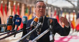 German defense minister says military draft could return if volunteer numbers fall short
