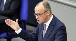 Germany finally appoints Friedrich Merz as chancellor in second round of voting after day of chaos in Berlin