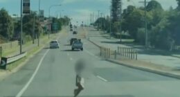 Heart-stopping moment nappy-wearing toddler dashes into dual carriageway leaving cars braking & swerving to avoid her