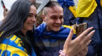 Homecoming Ukrainian soldiers are embraced by families after latest prisoner exchange with Russia - hours after Putin's army launched huge drone attack