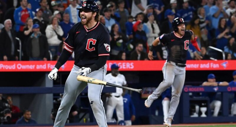'How about that?!' Listen to Tom Hamilton call Daniel Schneemann's game-winning grand slam for Cleveland Guardians against Toronto Blue Jays