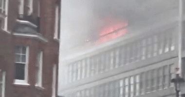 Huge fire rips through London tower block with flats engulfed in flames as 75 firefighters scrambled