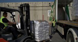 Israel may change tack to allow aid groups in Gaza to stay in charge of non-food aid