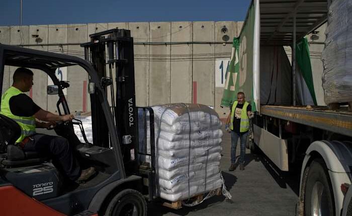 Israel may change tack to allow aid groups in Gaza to stay in charge of non-food aid
