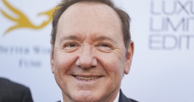 Kevin Spacey returns to the spotlight to receive award and slams Hollywood 'blacklist' culture during speech at Cannes gala - as it's claimed he is 'not welcome at the Film Festival'