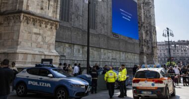 Killer on prison release stabs colleague before jumping to his death off Milan Cathedral in front of horrified tourists