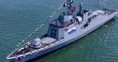 Kim Jong-un’s new flagship destroyer armed with nuclear missiles can’t even SAIL and has to be dragged around by tugs