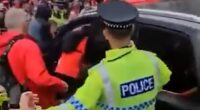 Liverpool parade suspect 'is a company director': Driver held after dozens hurt in 'car attack' is 'revealed to be married father-of-three from quiet cul-de-sac whose arrest has left neighbours stunned'