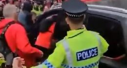 Liverpool parade suspect 'is a company director': Driver held after dozens hurt in 'car attack' is 'revealed to be married father-of-three from quiet cul-de-sac whose arrest has left neighbours stunned'