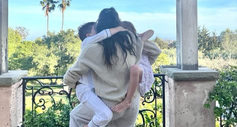 Meghan shares a new picture of Archie and Lilibet as she celebrates Mother's Day in the US: 'Cheers to juggling it all with joy!'