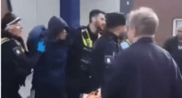 Moment Hamburg knifewoman is arrested after launching frenzied rampage at train station leaving at least 18 injured