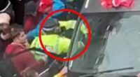 Moment Liverpool parade 'drug driver' is dragged out of car by police after injuring 65 people as it is claimed he was fuelled by 'road rage, not terror'