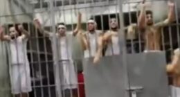 Moment deported Tren de Aragua gang inmates scream and rattle cells at US officials in notorious El Salvador mega-prison