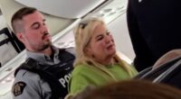 Moment 'mother and wannabe influencer daughter' are taken away by police after forcing UK flight to Jamaica to divert to Canada after parent 'shouted and swore at staff demanding to get off in mid-air'