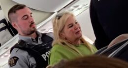 Moment 'mother and wannabe influencer daughter' are taken away by police after forcing UK flight to Jamaica to divert to Canada after parent 'shouted and swore at staff demanding to get off in mid-air'
