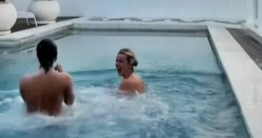Moment skinny dipping pals dive naked into pool they thought was their private sanctuary – before making shock discovery