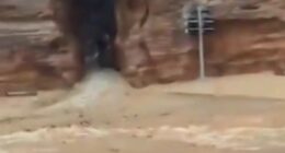 Mum and son found dead after flash flooding in tourist hotspot as hundreds are evacuated