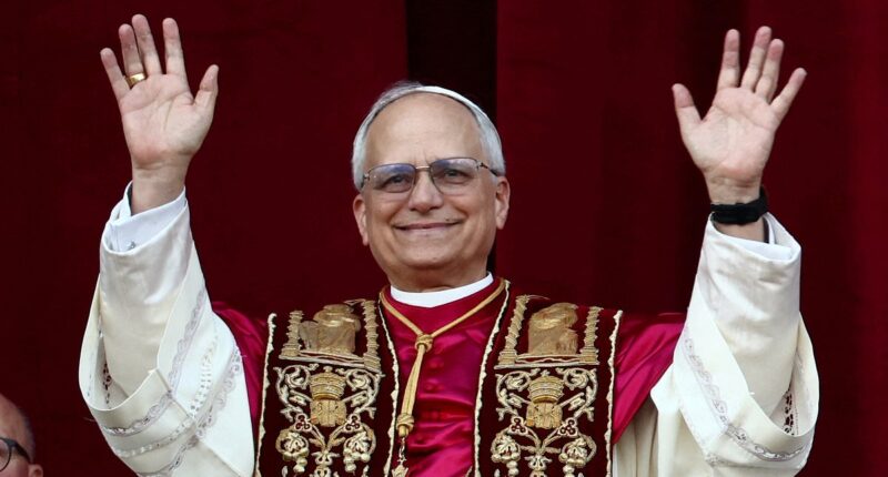 New pope is revealed: The 267th pontiff is named as cardinal announces 'Habeus Papam!' in front of thousands of cheering Catholics