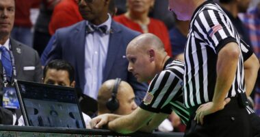 Out-of-bounds plays could be reviewed only by coach challenge under NCAA rules panel recommendation