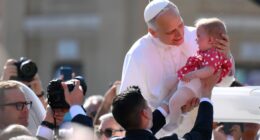 Pope Leo holds baby & waves to crowds in St Peter’s Square as world leaders gather for Pontiff’s inauguration mass
