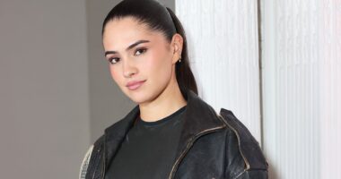 Romeo Beckham's girlfriend Kim Turnbull puts on a brave face at Maison Crivelli event in London as she's pulled into the 'family feud'