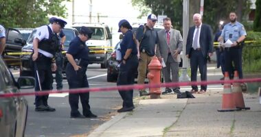 Rookie Philadelphia police officer shot in stomach while trying to break up fight near high school