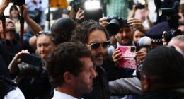 Russell Brand Arrives at London Court for First Hearing on Rape Charges