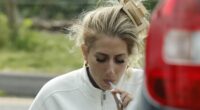 Stacey Solomon puffs on a cigarette by the side of the road as stressed-out star leaves local vet surgery in tears